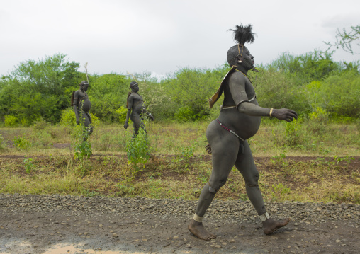 Bodi Tribe Fat Men Going To The Kael Ceremony, Hana Mursi, Omo Valley, Ethiopia