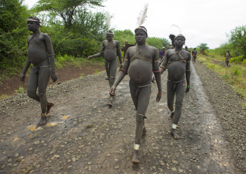 Bodi Tribe Fat Men Going To The Kael Ceremony, Hana Mursi, Omo Valley, Ethiopia