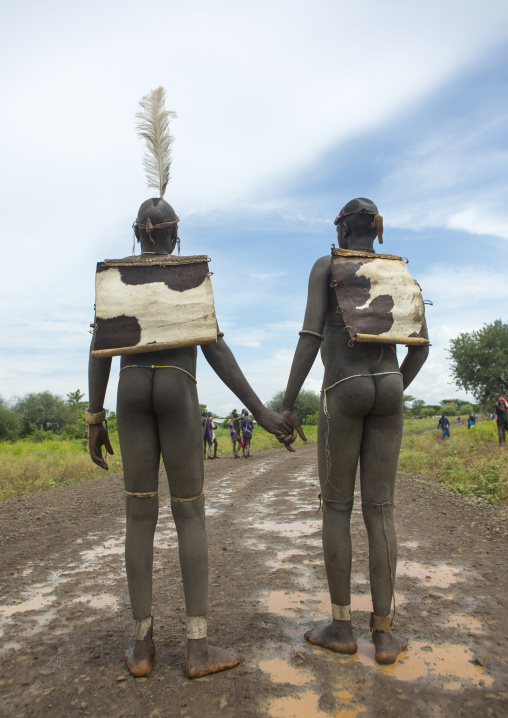 Bodi Tribe Fat Men Going To The Kael Ceremony, Hana Mursi, Omo Valley, Ethiopia