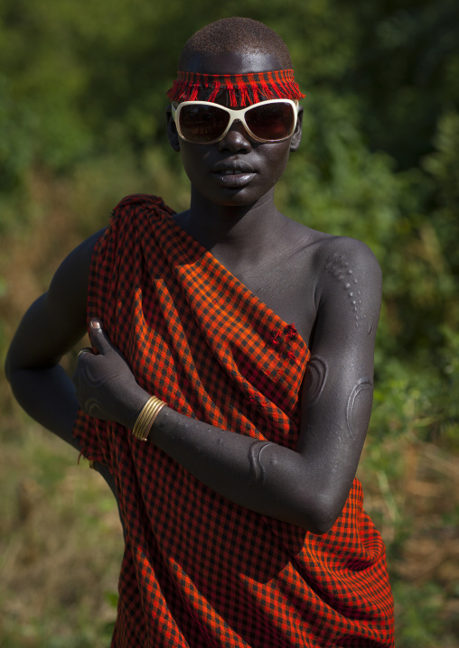 Bodi Tribe Young Woman With Sunglasses, Hana Mursi, Omo Valley, Ethiopia