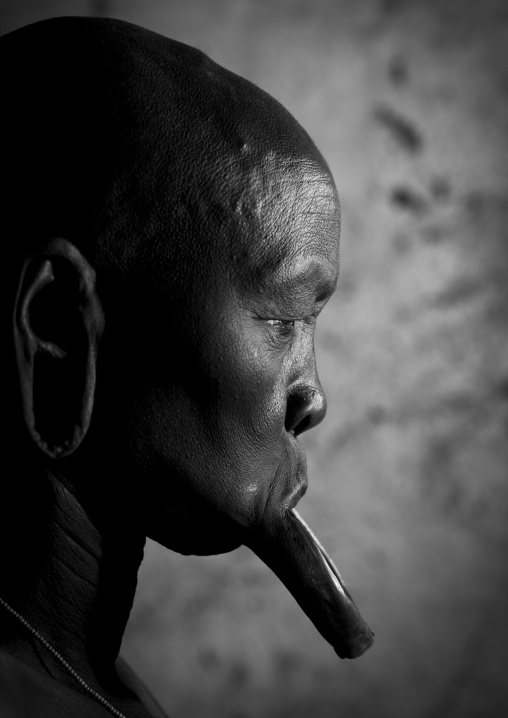 Portrait Of A  Mursi Tribe Woman With Enlarged Lip In Mago National Park, Omo Valley, Ethiopia