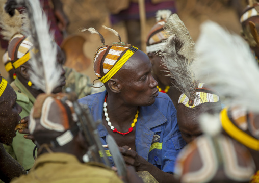 Dassanech Tribe Warriors Sharing Cow Meat During A Ceremony, Omorate, Omo Valley, Ethiopia