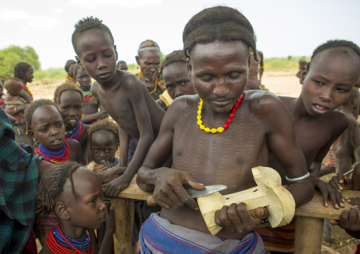 Dassanech Tribe Man Making A Wood Headrest, Omorate, Omo Valley, Ethiopia