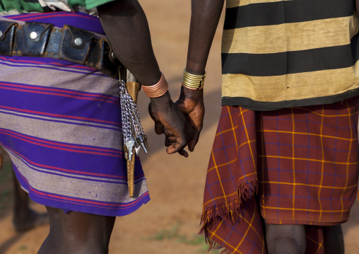 Bashada Tribe Men Walking Hand In Hand, Dimeka, Omo Valley, Ethiopia