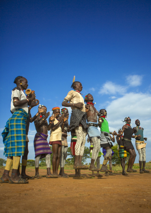 Bashada Tribe Men Dancing And Jumping, Dimeka, Omo Valley, Ethiopia