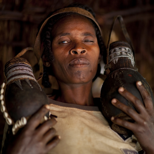 Guji Tribe Woman Carrying Two Calabashes, Omo Valley, Ethiopia