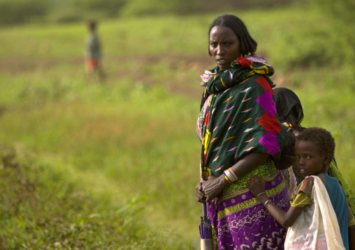 Borana Woman Tribe Dressed In Traditional Manner With Children, Omo Valley, Ethiopia