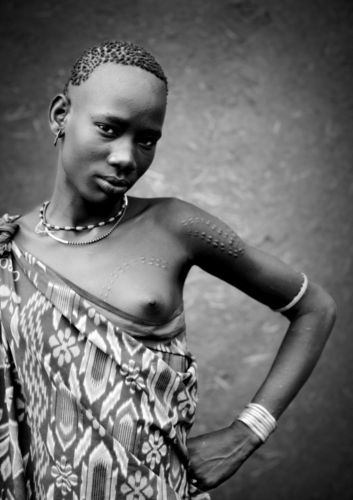 Black And White Portrait Of Miss Bichai, Young Bodi Tribe Woman With Traditional Hairstyle And Scarifications, Hana Mursi, Omo Valley, Ethiopia