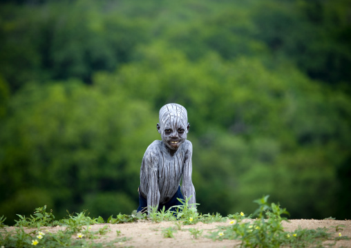 Kid With Body Paintings Climbing Back From The Omo River, Korcho, Omo Valley, Ethiopia