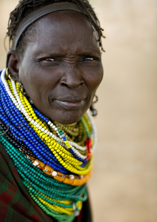 Portrait Of A Nyangatom Tribe Woman With Huge And Colourful Necklaces, Omo Valley, Kangate, Ethiopia