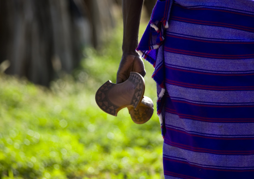 Karo Woman Carrying Headrest In Hand Ethiopia