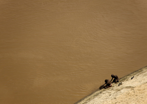 Aerial View Of Karo Kids Washing In Omo River, Korcho Village, Ethiopia