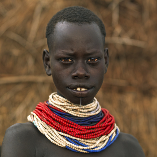 Portrait Of A Karo Tribe Girl With Traditional Necklaces, Korcho Village, Omo Valley, Ethiopia