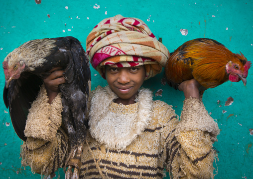 Kid Holding Two Chicken, Jemu, Omo Valley, Ethiopia