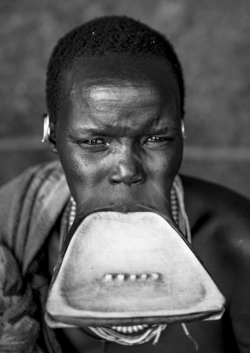 Suri tribe woman with a lip plate, Kibish, Omo valley, Ethiopia