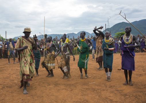 Suri tribe people dancing at a ceremony, Kibish, Omo valley, Ethiopia