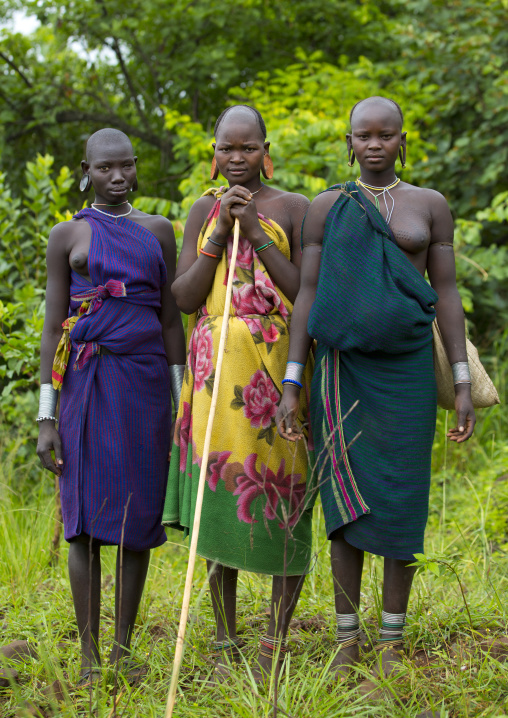 Suri tribe women with enlarged earlobe, Kibish, Ethiopia