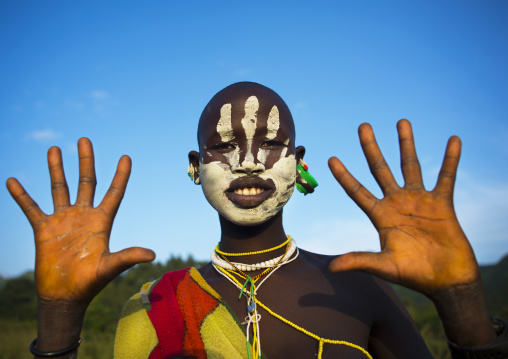 Suri tribe woman with body paintings, Tulgit, Omo valley, Ethiopia