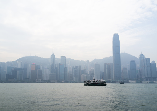 A star ferry leaving its Tsim Sha Tsui pier in kowloon to reach the central pier, Special Administrative Region of the People's Republic of China , Hong Kong, China