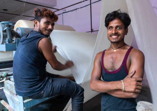 Smiling indian workers in a saree factory, Rajasthan, Sanganer, India