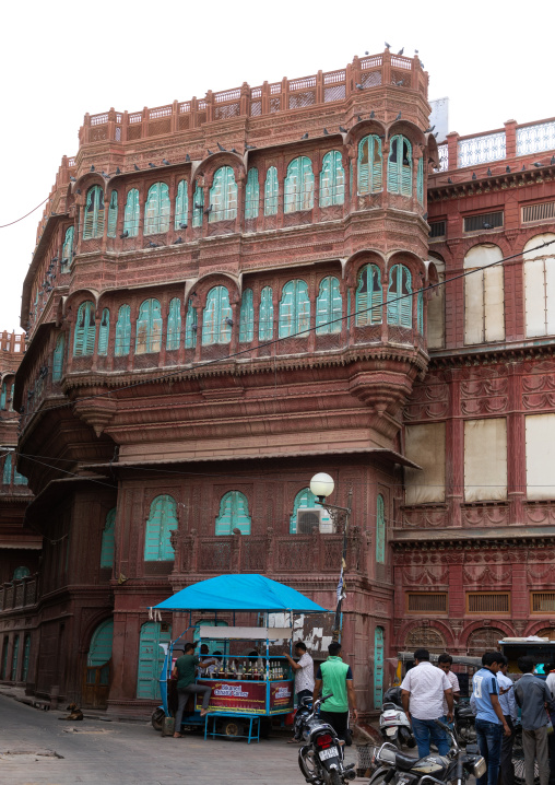 Small food stall in front of a haveli in the old city, Rajasthan, Bikaner, India