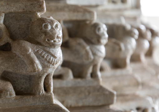 Carved bas relief made of white marble on the wall of Tirthankar jain temple, Rajasthan, Ranakpur, India