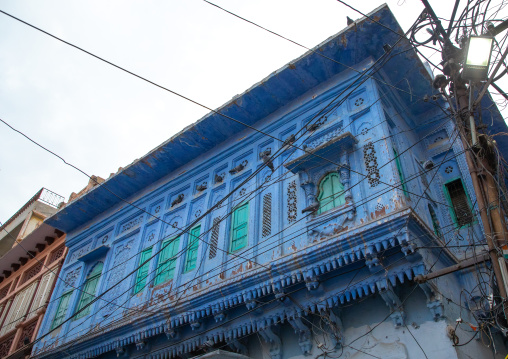 Old blue house balcony of a brahmin, Rajasthan, Jodhpur, India