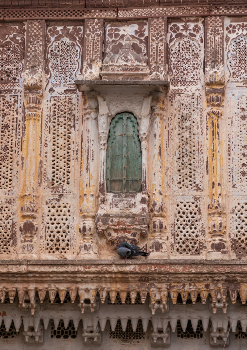 Old carved balcony of a haveli, Rajasthan, Jodhpur, India