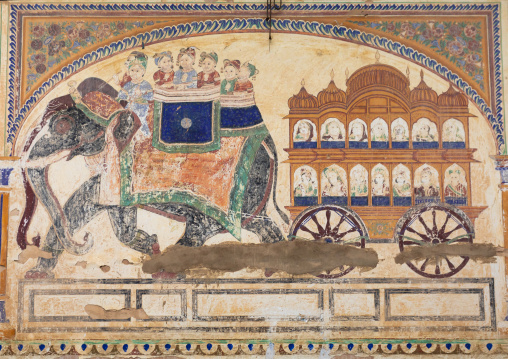 Wall paintings depicting indian people on an elephant on an old haveli, Rajasthan, Nawalgarh, India