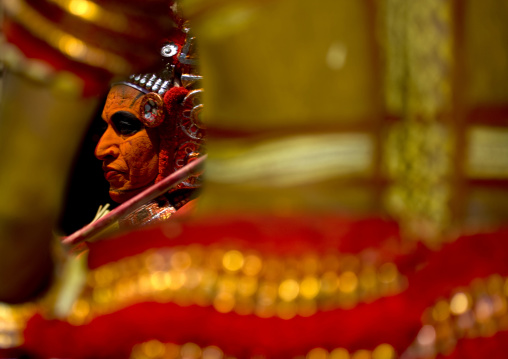 Man Dressed For Theyyam Ritual With Traditional Painting On His Face, Thalassery, India