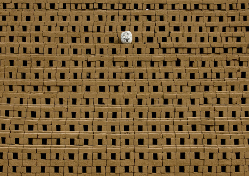 Bricks Protected By A Pumpkin, Pondicherry, India