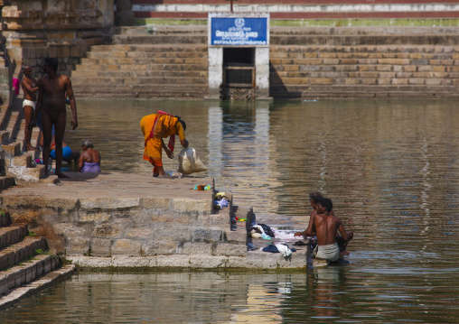 People Doing Their Laundry On The Stairs Around The Mahamaham Tank, Kumbakonam, India