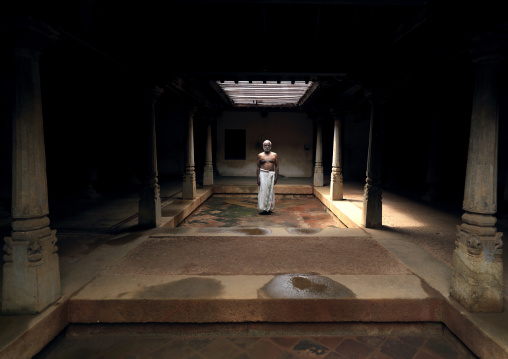 Shitless Man Posing In A Dark Room In His Past Old House In Kanadukathan Chettinad, India