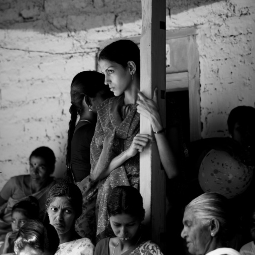 Attentive Young Woman In The Audience During Theyyam Ceremony, Thalassery, India