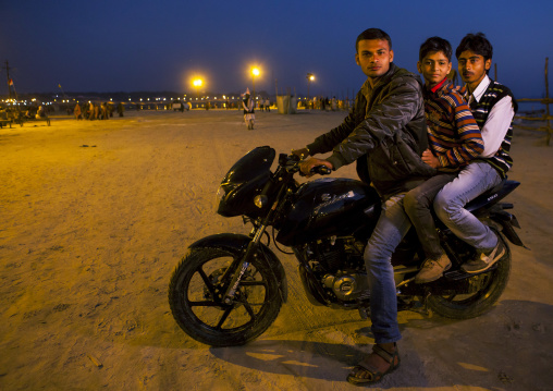 Pilgrims On A Moto At Maha Kumbh Mela, Allahabad, India