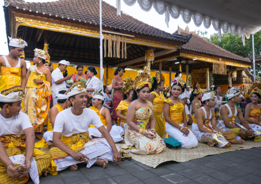 Teenagers In Traditional  Costumes  Before A Tooth Filing Ceremony