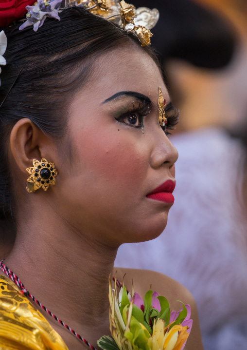 A Teenager Girl In Traditional  Costume Crying Before A Tooth Filing Ceremony