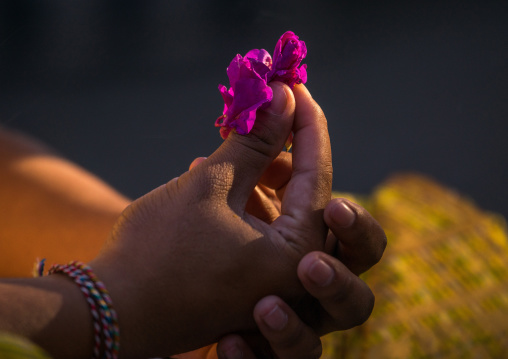 A Teenager Girl With Flowers In The Hands In Traditional  Costume  Before A Tooth Filing Ceremony