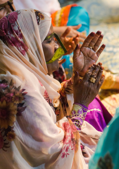 women with traditional burqas masks during a zar ceremony, Qeshm Island, Salakh, Iran