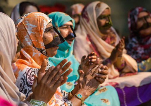 women with traditional burqas masks during a zar ceremony, Qeshm Island, Salakh, Iran