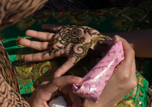 little girl with henna painted hands, Hormozgan, Bandar-e Kong, Iran