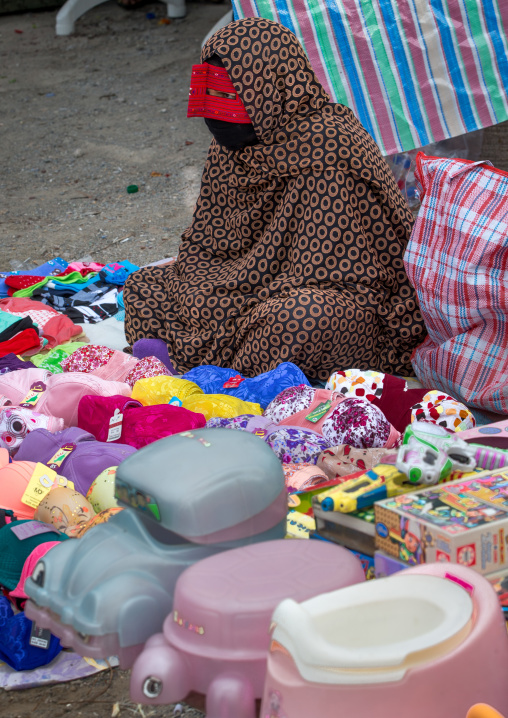 a bandari woman wearing a traditional mask called the burqa at panjshambe bazar thursday market, Hormozgan, Minab, Iran