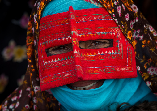 a bandari woman wearing a traditional mask called the burqa at panjshambe bazar thursday market, Hormozgan, Minab, Iran