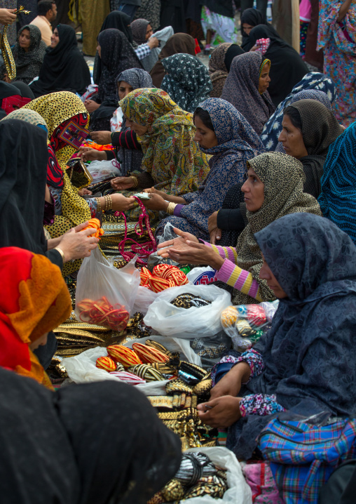 a bandari woman wearing a traditional mask called the burqa at panjshambe bazar thursday market, Hormozgan, Minab, Iran