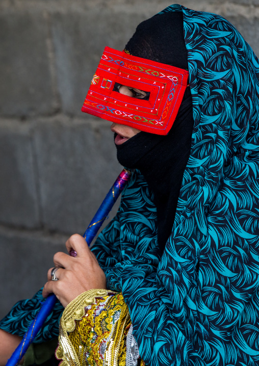 a bandari woman wearing a traditional mask called the burqa at panjshambe bazar thursday market, Hormozgan, Minab, Iran