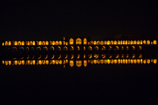 a view of the si-o-seh bridge at night highlighting the 33 arches, Isfahan Province, isfahan, Iran