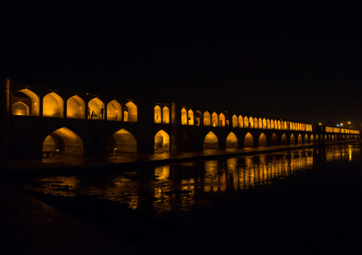 a view of the si-o-seh bridge at night highlighting the 33 arches, Isfahan Province, isfahan, Iran