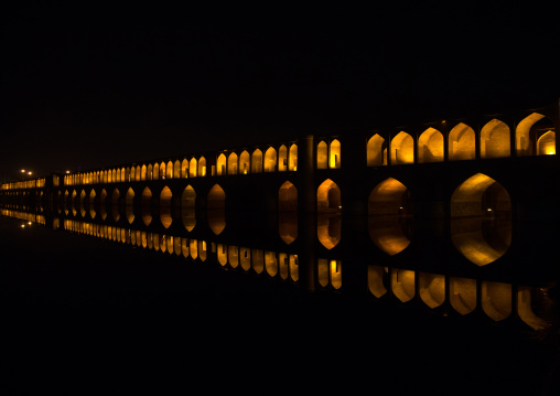 a view of the si-o-seh bridge at night highlighting the 33 arches, Isfahan Province, isfahan, Iran