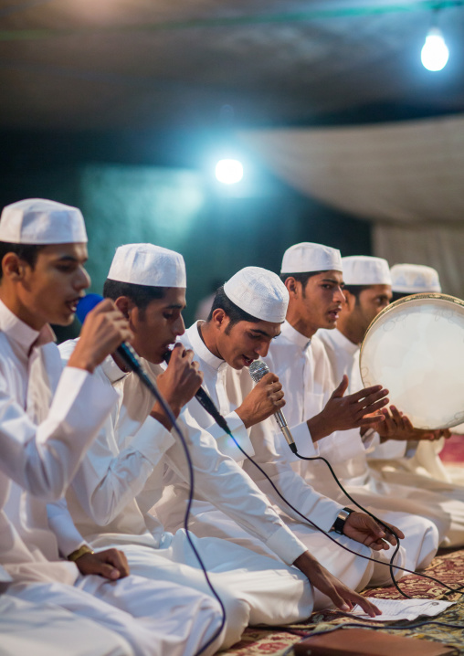 men singing and playing music during a wedding ceremony, Qeshm Island, Tabl , Iran