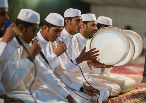 men singing and playing music during a wedding ceremony, Qeshm Island, Tabl , Iran